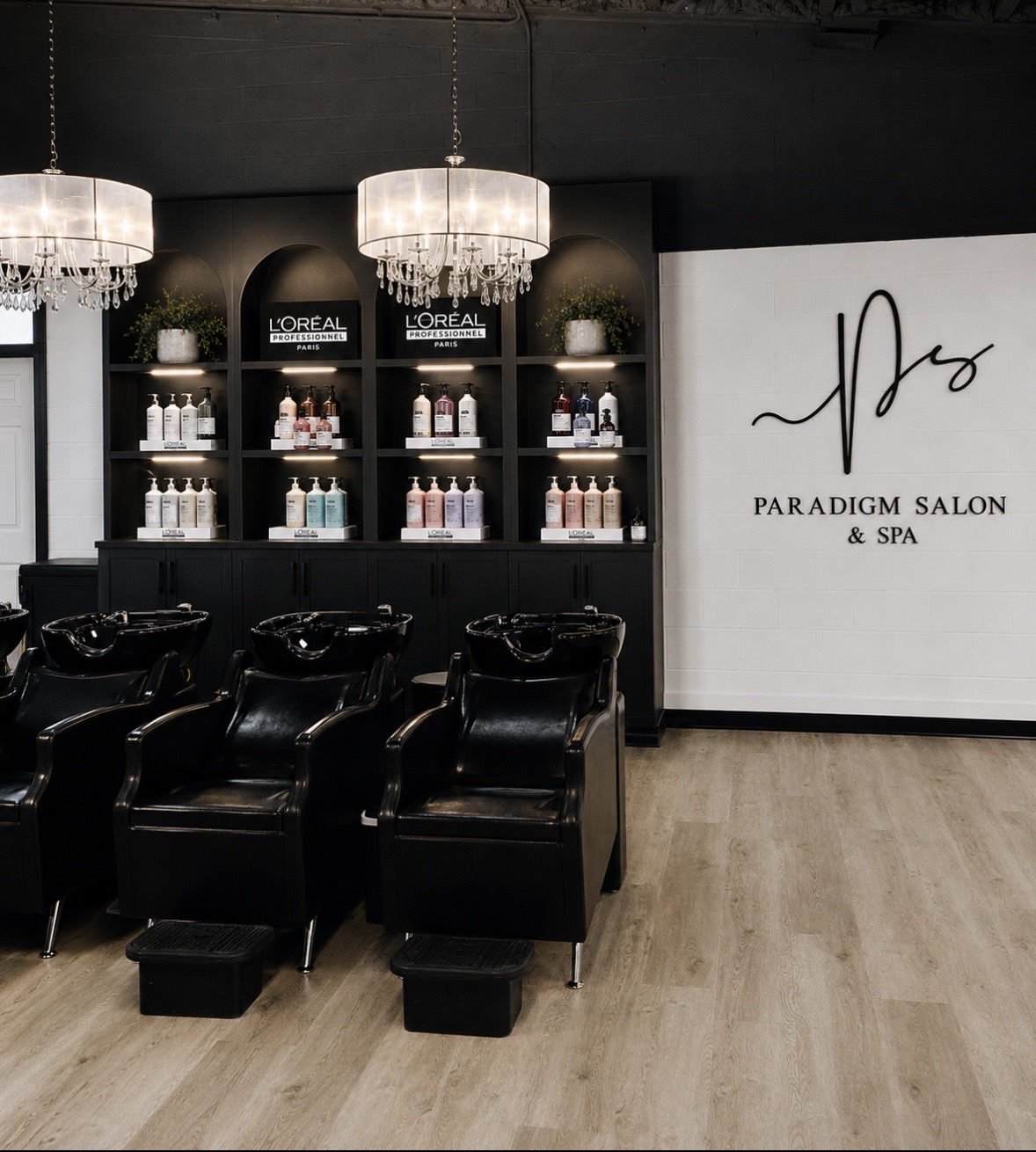 Backbar and wash stations at Paradigm Salon & Spa