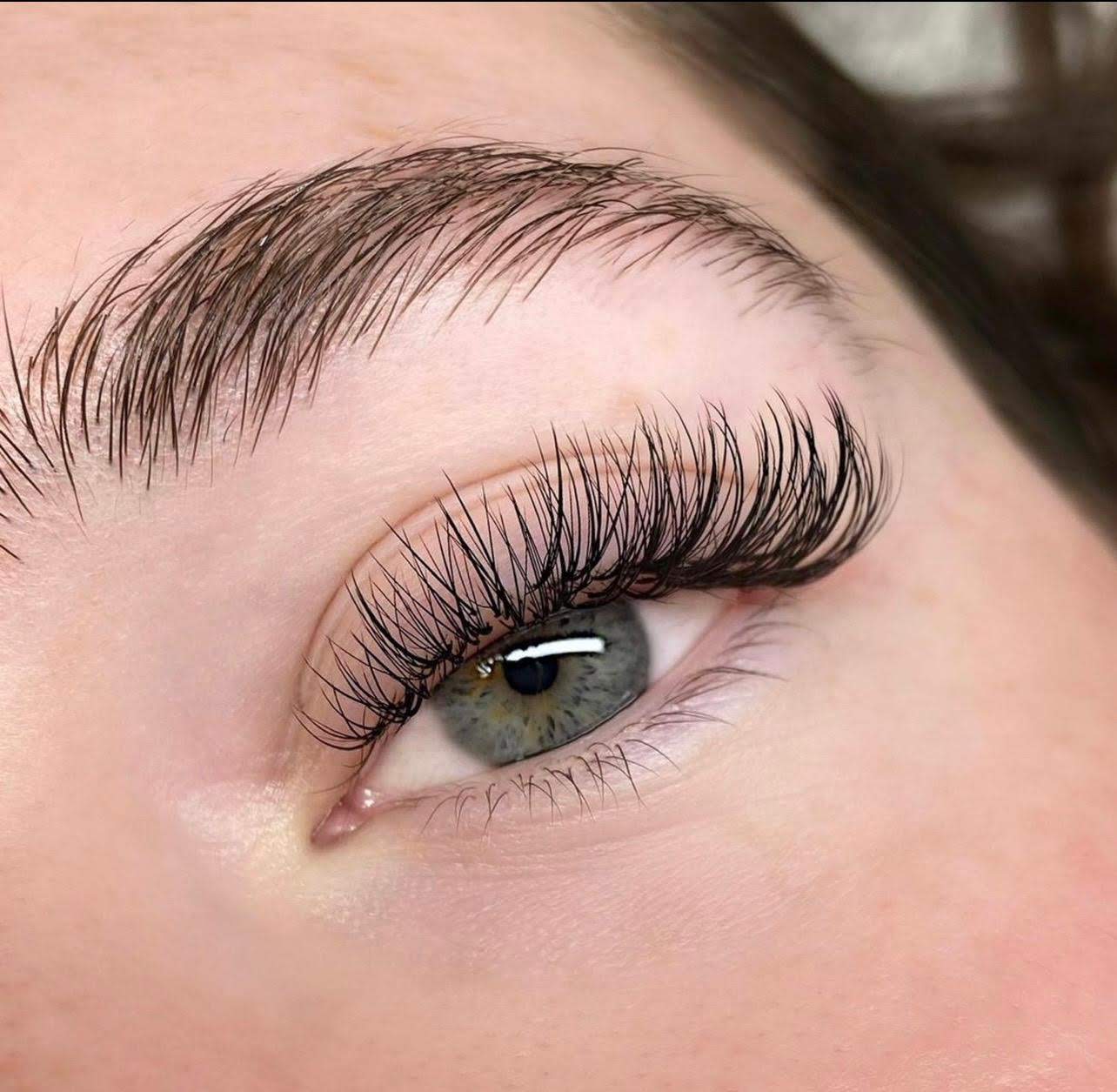 Beautiful lash extensions applied at Paradigm Salon & Spa