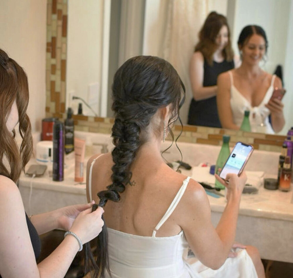 Bride getting her hair styled in our salon